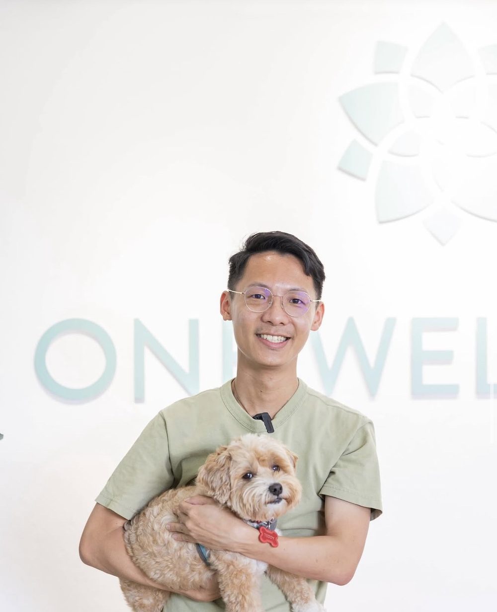 Dr. Tan, veterinarian and animal communicator, with Teddy
